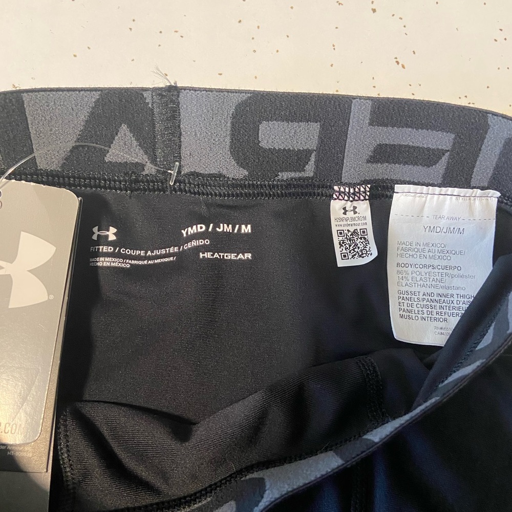 Under armour boys fitted shorts. Youth medium. Brand new.